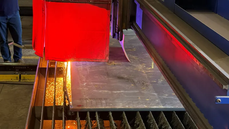 CNC plasma table cutting steel plate in the Ramco shop